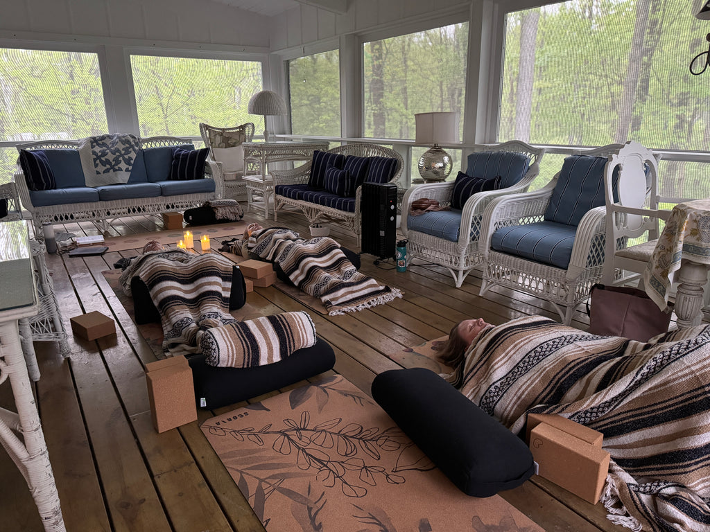 Relaxing yoga retreat on a screened-in deck. 